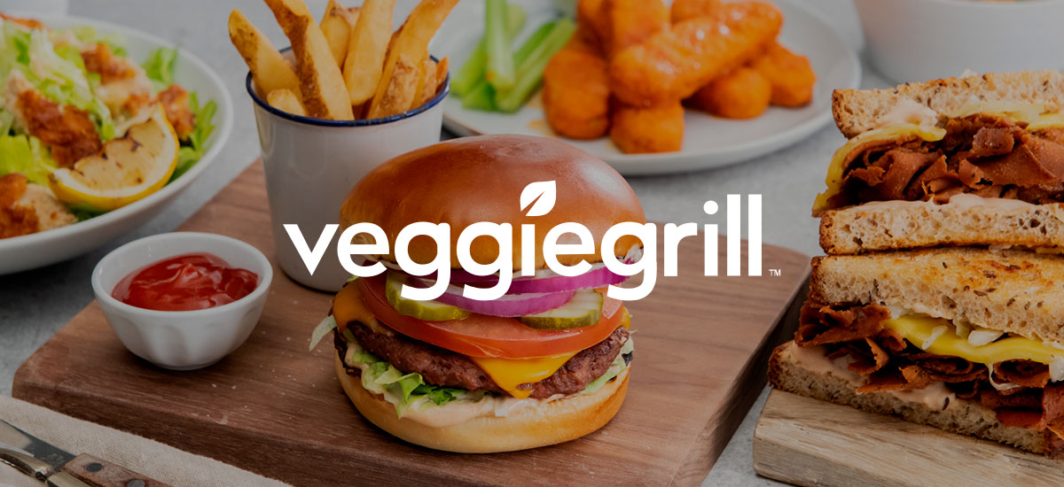 TheWorks-Veggie-Grill Veggie Grill logo over an image of vegetarian burger, sandwich, and fries.